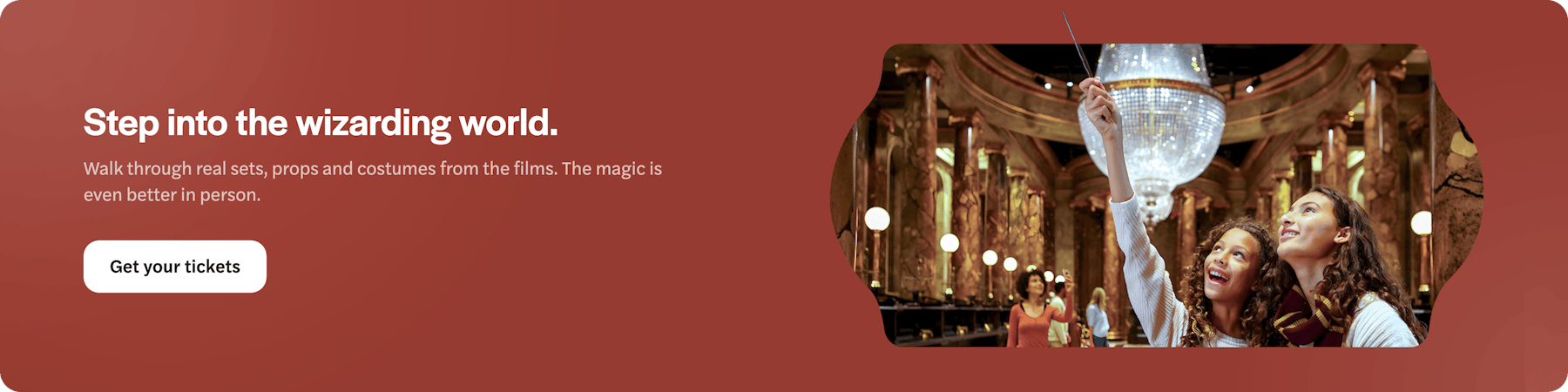 Visitors exploring the Great Hall set at Warner Bros Studio Tour London.